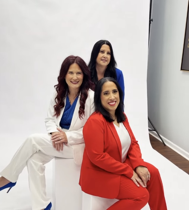 Portrait of the three women who lead operations, finance and marketing at DA Construction